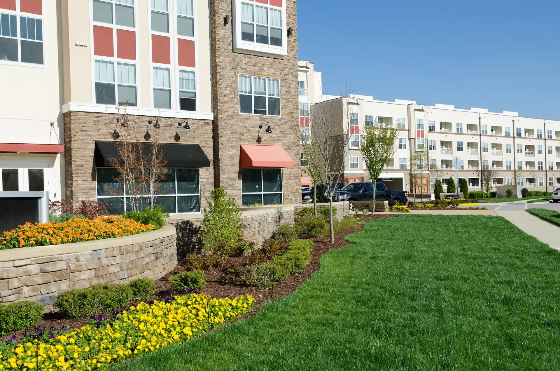 Reviving the beauty with hardscape and landscaping in a commercial apartment.