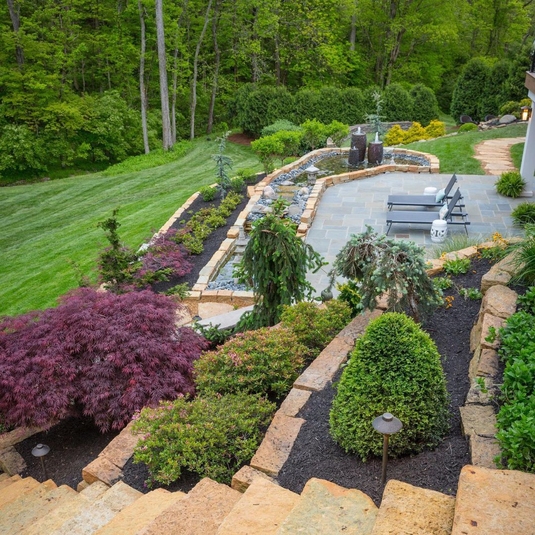 Beautiful landscaped field with hardscape design.